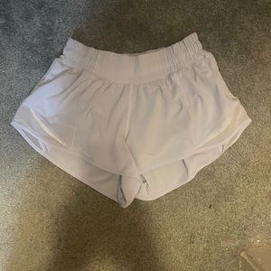 LULULEMON SIZE TWO HOTTY HOT SHORTS. LOWRISE, 2.5 inch. LIGHT BLUE